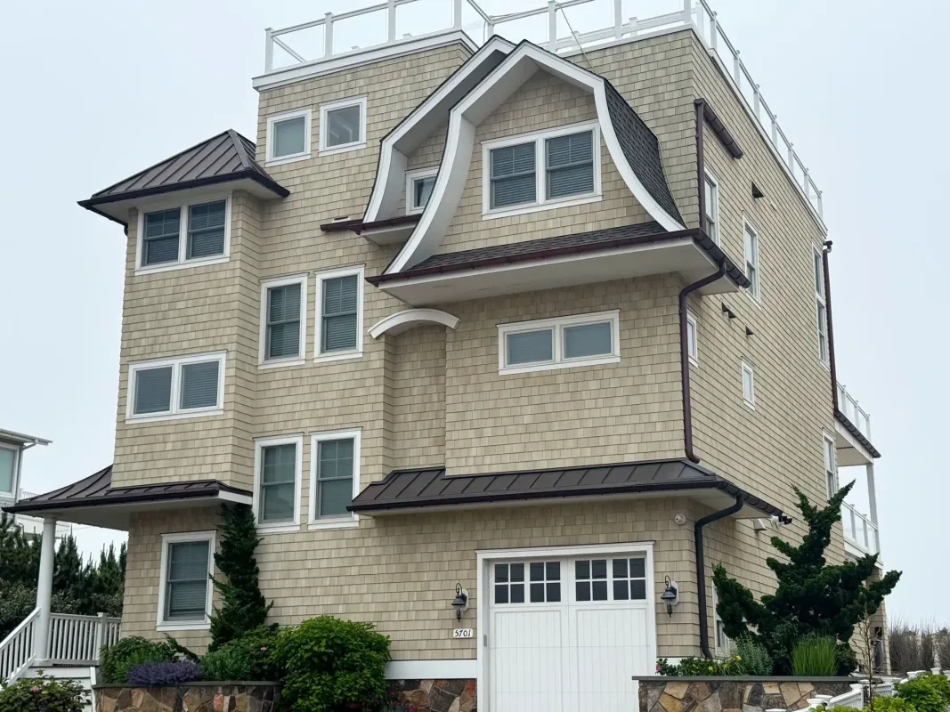 Bronze seamless gutters and downspouts on a cedar-shingle beach house in Sicklerville, NJ