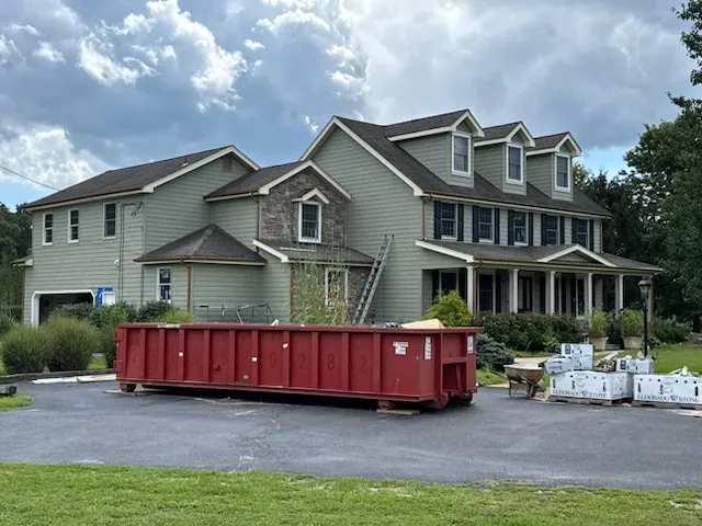 Gutter replacement project on a two-story colonial home in West Berlin, NJ