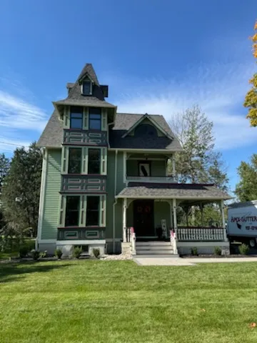 Completed gutters on a green Victorian home in West Berlin, NJ