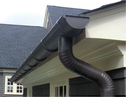 Dark bronze half-round gutter and round downspout installed in West Berlin, NJ